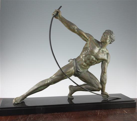 J De Roncourt. A bronzed metal figure of a strong man bending an iron bar, 28.5in.